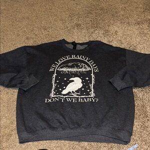 We love rainy days don't we baby crow rain graphic sweatshirt size XL READ desc.